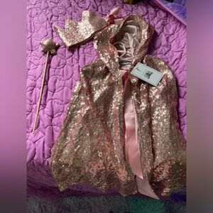 Brand new* Beautiful sequin cape, crown, and wand.
